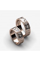 gold wedding rings with a geometric pattern design