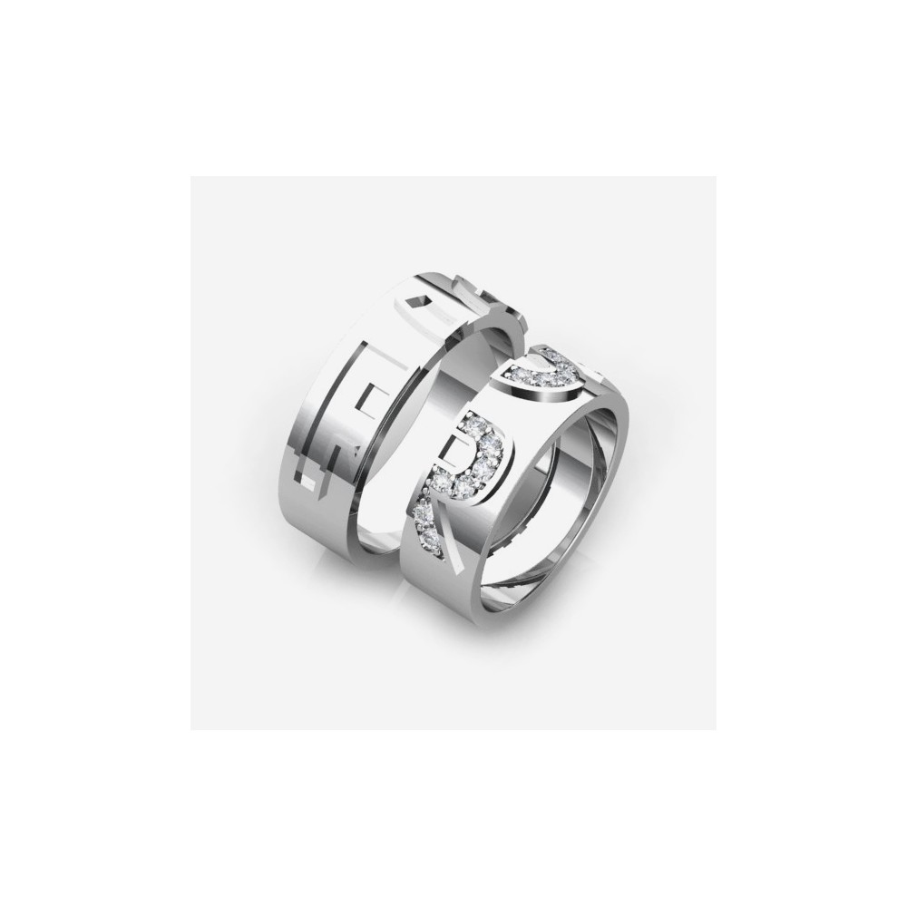 creative wedding ring with initials in brilliants on the bride's ring