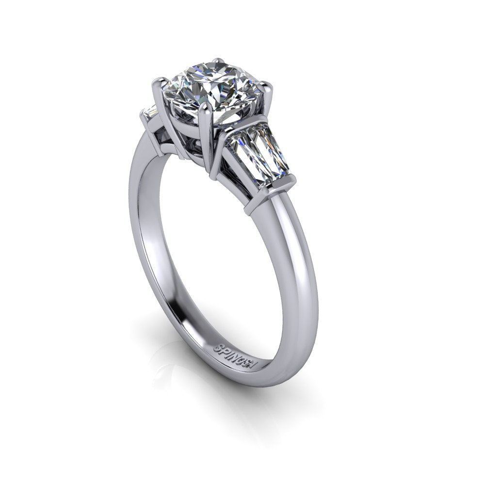 Trilogy ring with Brilliant and Baguette cut Diamonds