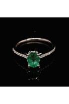 OVAL CUT EMERALD RING WITH DIAMONDS