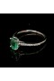 OVAL CUT EMERALD RING WITH DIAMONDS