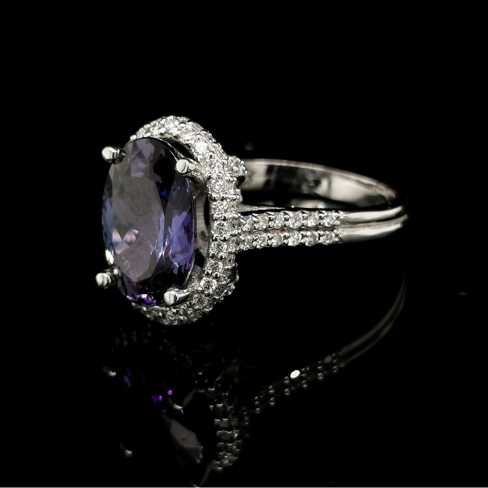 TANZANITE RING WITH HALO DIAMONDS AND ACCENTS