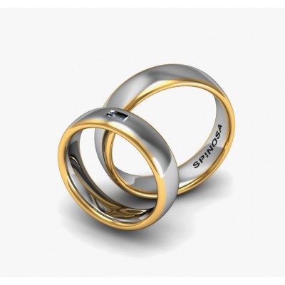 Обручальные кольца в форме половины тростника с бриллиантом багетной огранки