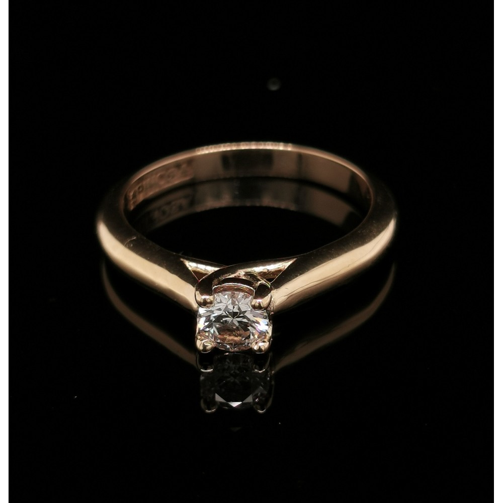 ENGAGEMENT RING WITH CENTRAL DIAMOND 0,30 CT.