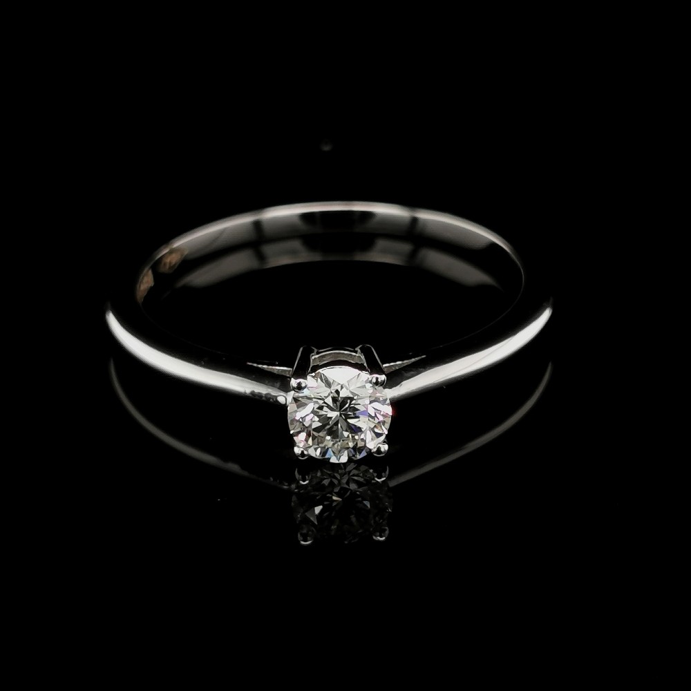 ENGAGEMENT RING WITH CENTRAL DIAMOND 0.35 CT.