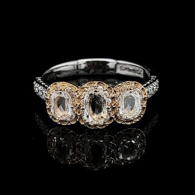 TRILOGY RING WITH 0.25 CT. CENTRAL OVAL CUT DIAMOND