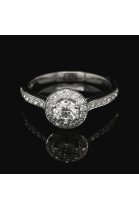 0.41 CT. CENTRAL DIAMOND RING WITH HALO