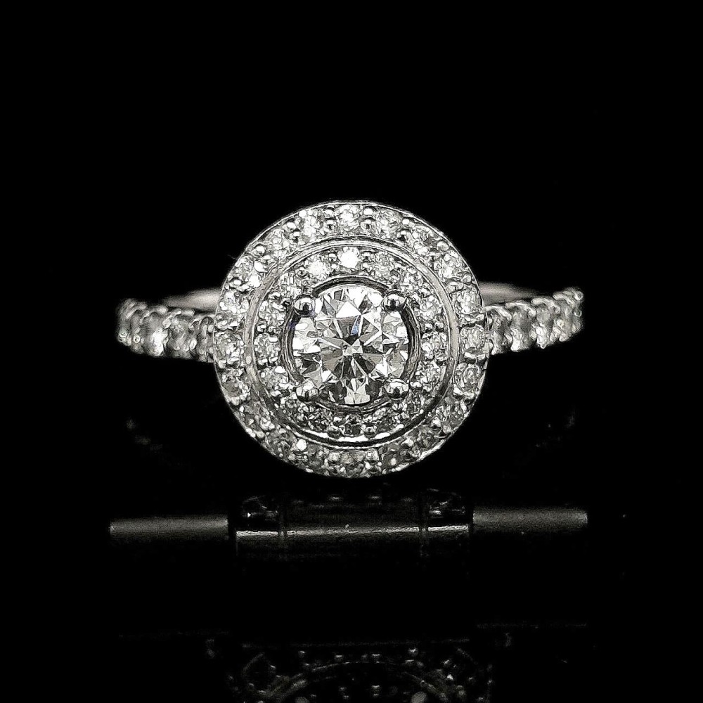 0.43 CT. CENTRAL DIAMOND ENGAGEMENT RING WITH HALO