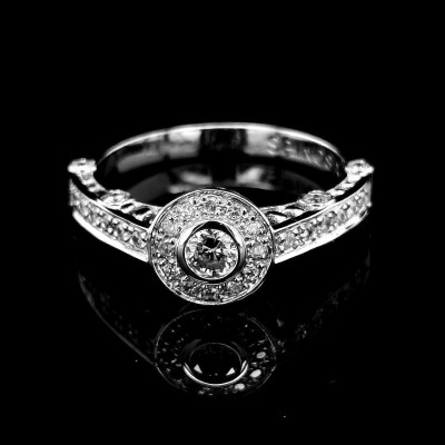 HALO RING WITH 0.20 CT. CENTRAL DIAMOND