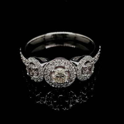 0.19 CT. CENTRAL FANCY DIAMOND RING