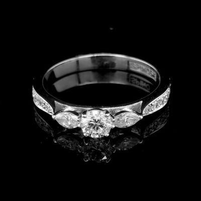 TRILOGY RING WITH 0.32 CT. CENTRAL BRILLIANT AND MARQUISE DIAMONDS
