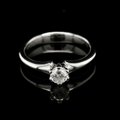 SOLITAIRE RING WITH CENTRAL DIAMOND 0.33 CT.