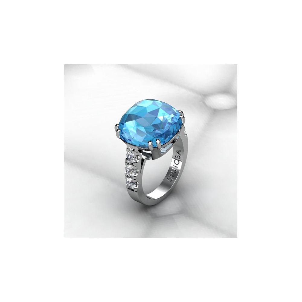 anillo con topacio azul en talla cojin y brillantes