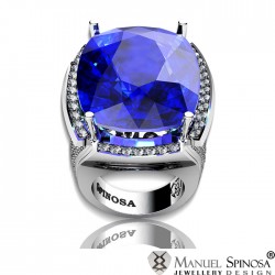 anillo de oro blanco con topacio azul y diamantes