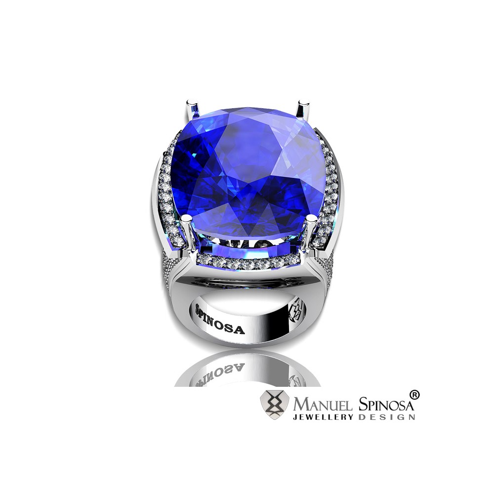 anillo de oro blanco con topacio azul y diamantes
